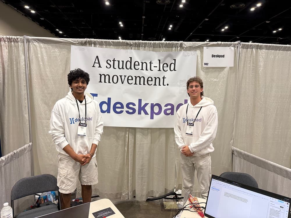 Akshay Ganesh and Daniel Troshin at the Deskpad booth at ISTE 2026, in front of a banner reading A student-led movement